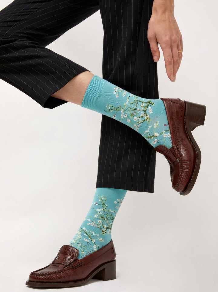 Van Gogh Almond Blossom art socks worn with brown loafers and pinstripe suit – museum art gift from ArtyGifts
