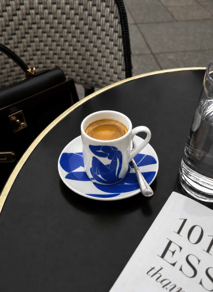 ArtyGifts espresso cup The Blue Figure by Henri Matisse on dark table – lifestyle shot