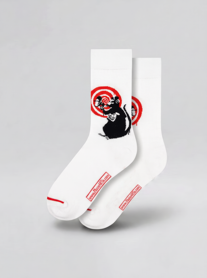 Pair of white Banksy-inspired Radar Rat art socks with black rat motifs and red circular details, displayed against a pale grey background.
