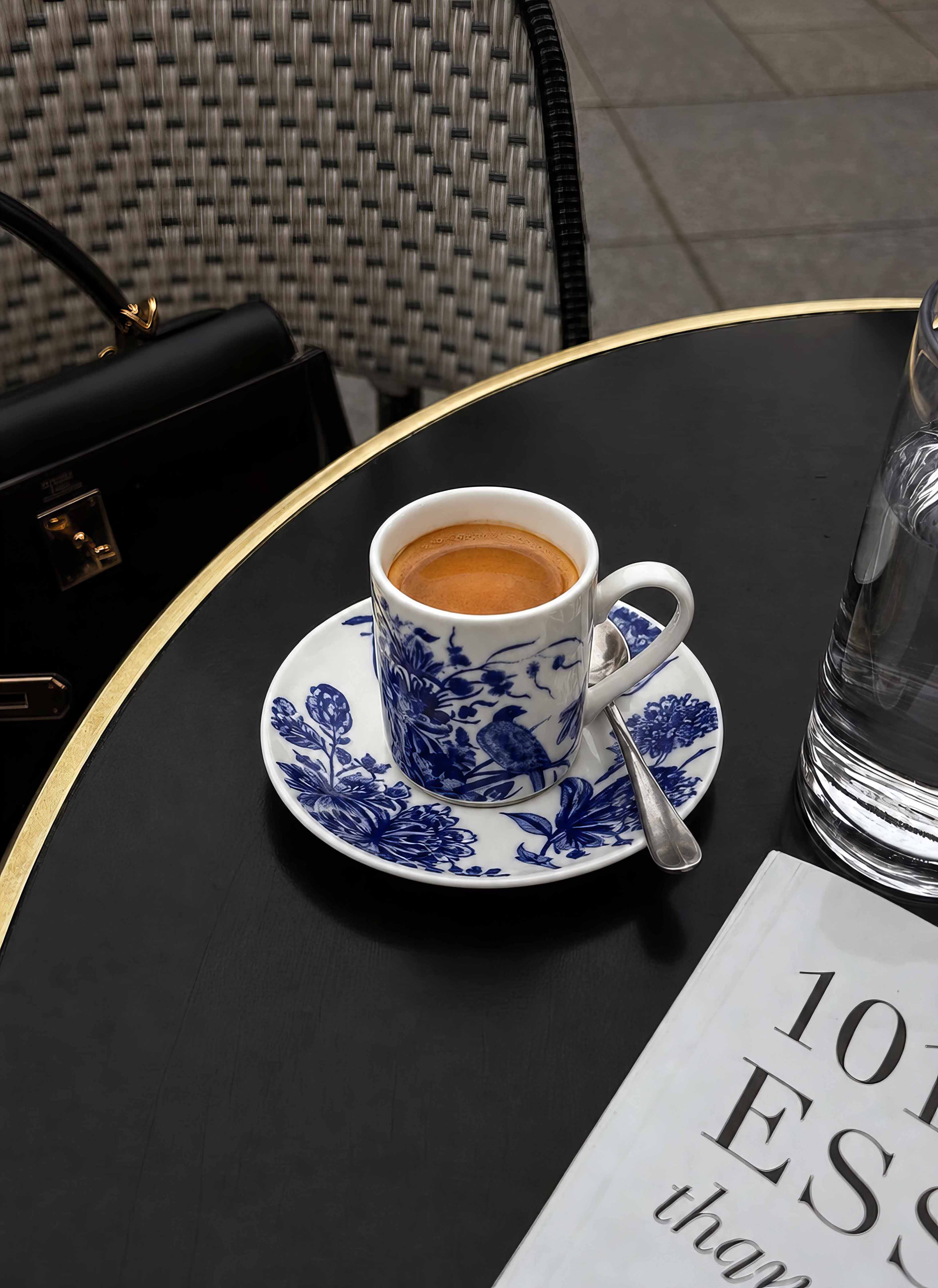Delft Blue Birds espresso cup and saucer on dark table — Rijksmuseum x ArtyGifts museum tableware
