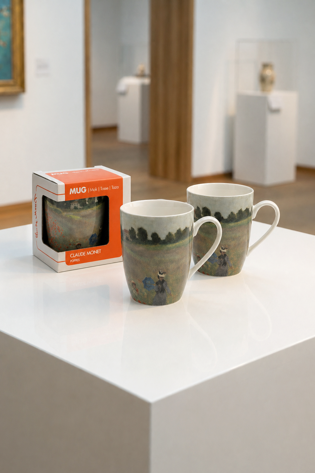 Two porcelain mugs with the Field with Poppies design by Claude Monet displayed in a museum shop — ArtyGifts
