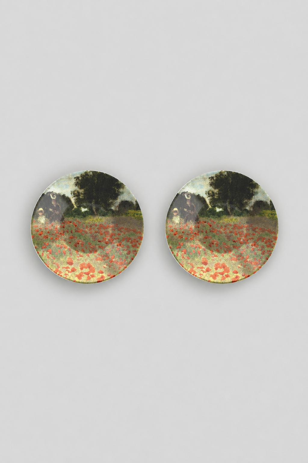 Top view of porcelain saucers featuring Field with Poppies by Claude Monet from ArtyGifts
