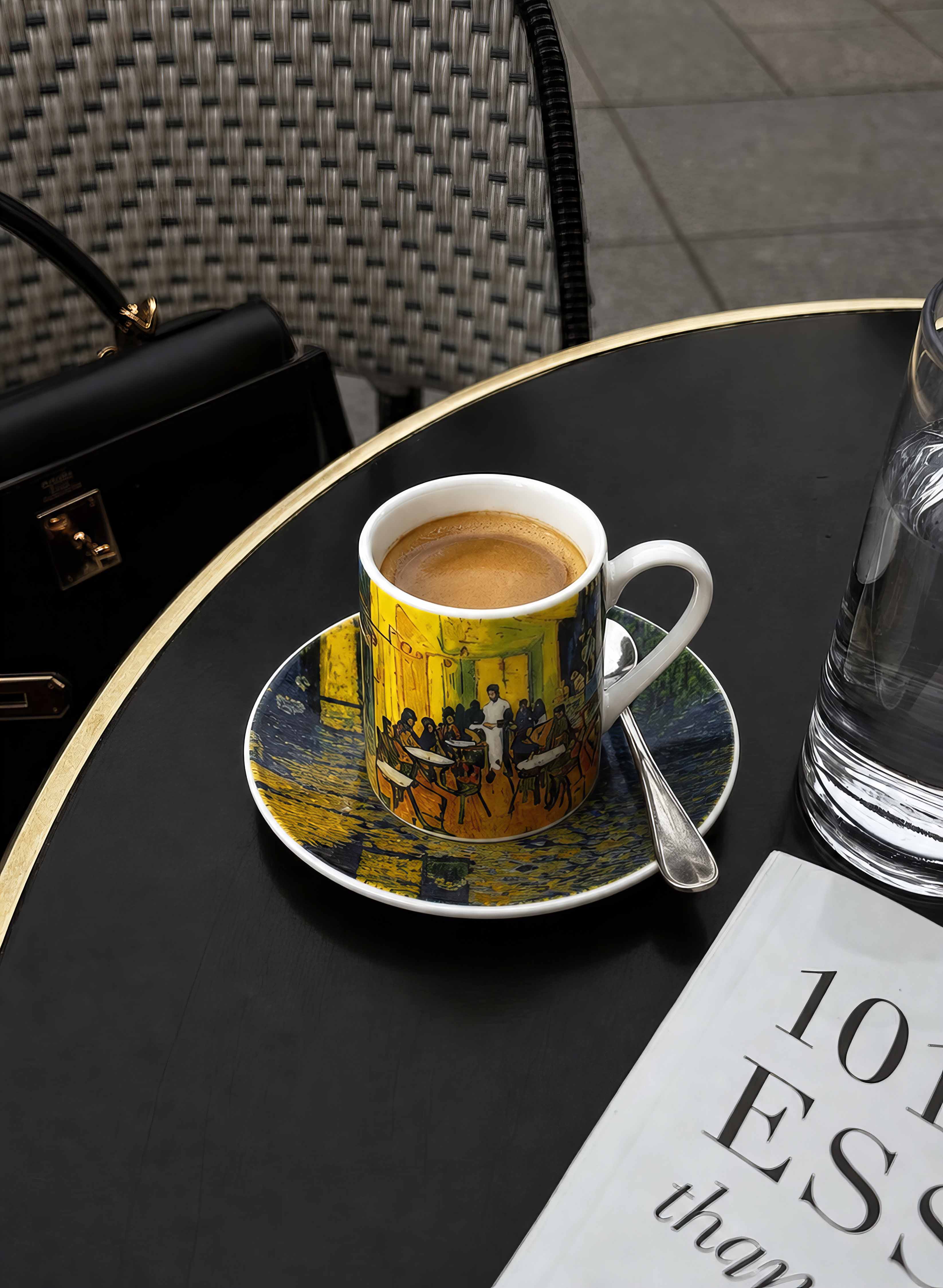 Woman enjoying espresso with Van Gogh Terrace at Café at Night espresso set – ArtyGifts museum gift
