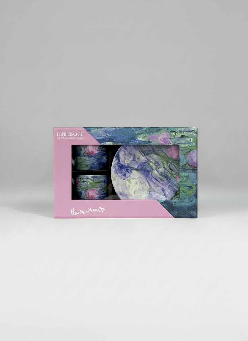 Set of ceramic items with floral design in a branded box on a gray background. Water Lilies by Claude Monet