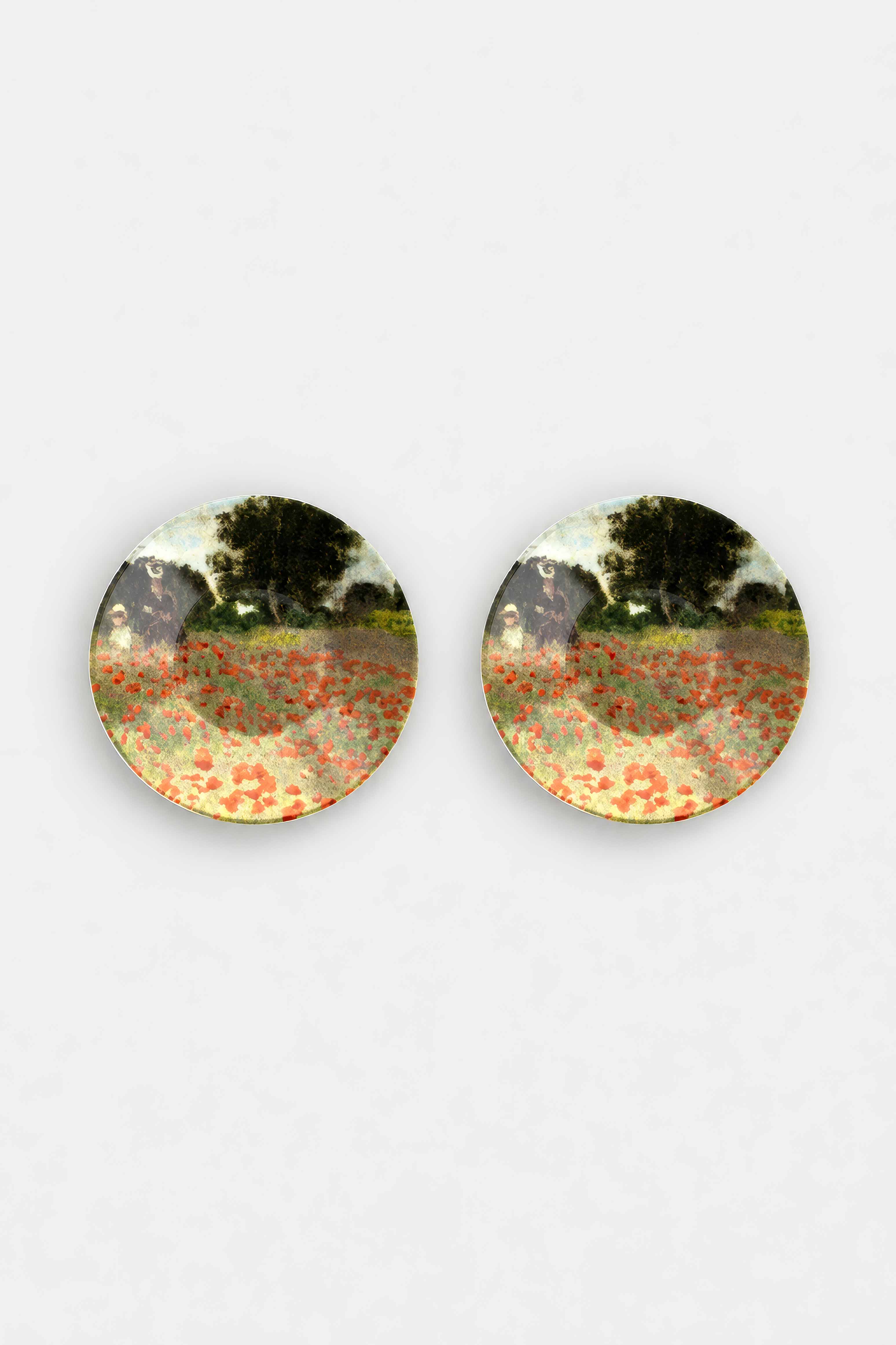 Top view of porcelain saucers featuring Field with Poppies by Claude Monet — ArtyGifts museum tableware
