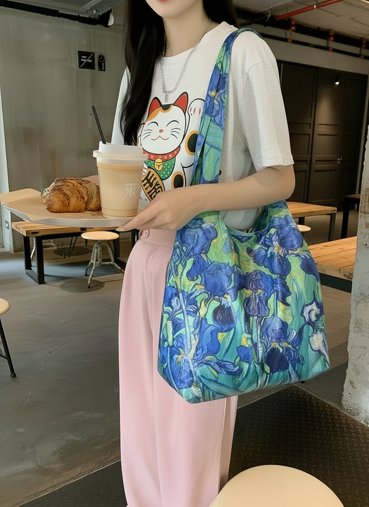 Foldable Shopper Bag Irises Vincent van Gogh – woman carrying art bag on the street | ArtyGifts
