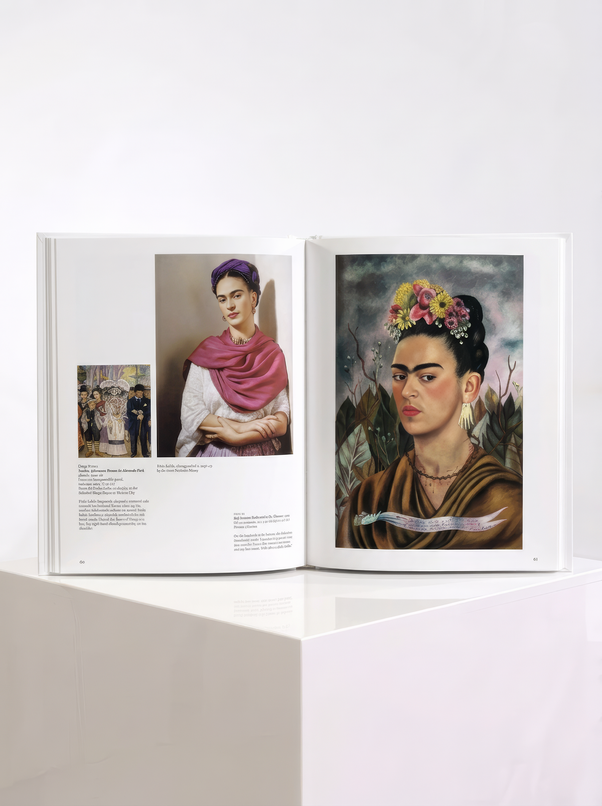 Open TASCHEN Frida Kahlo art book showing a colour photograph of the artist on the left and a self-portrait with flowers in her hair on the right.
