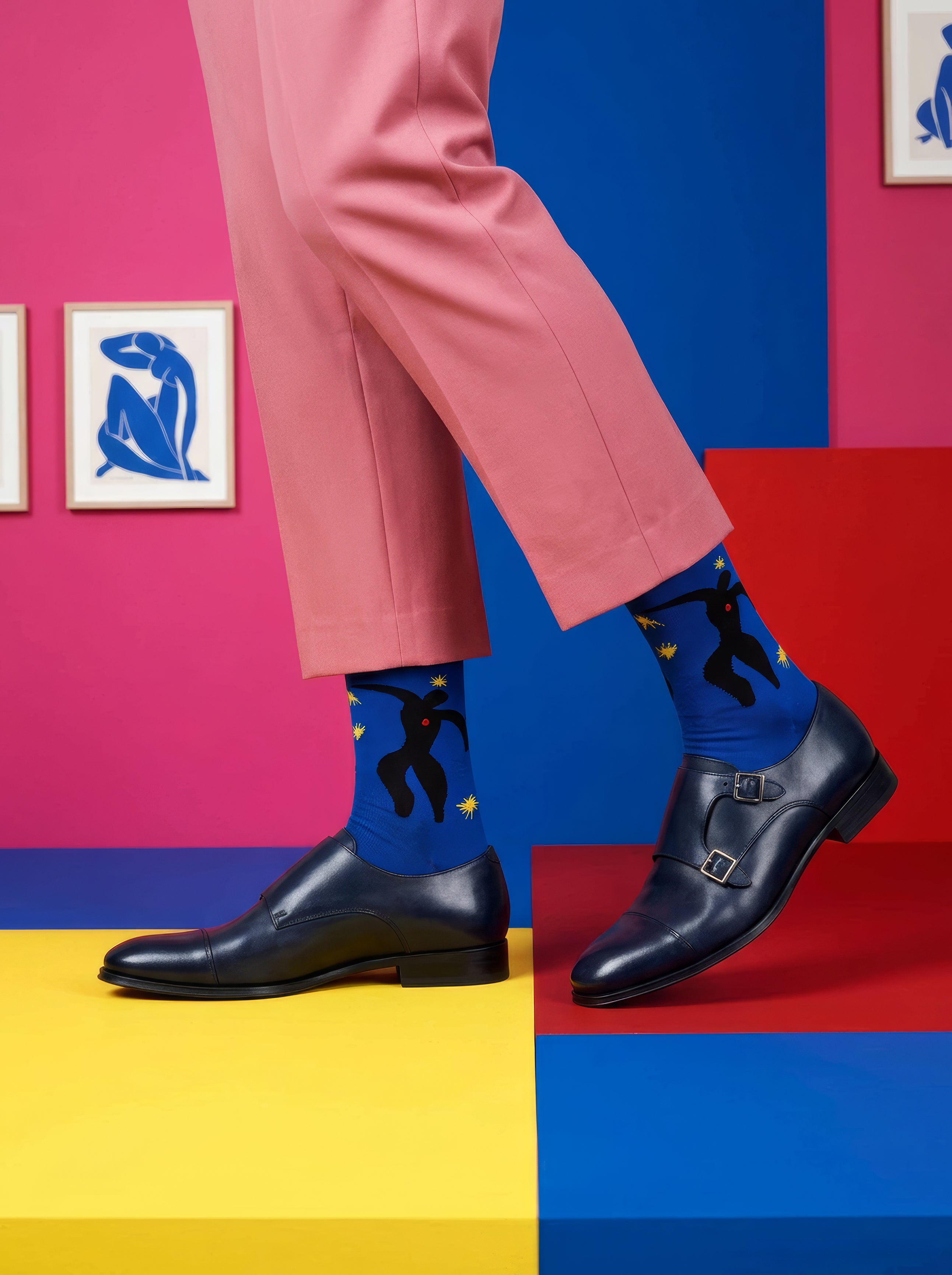 Henri Matisse Icarus art socks worn with black Chelsea boots and pink trousers on colourful steps – museum art gift from ArtyGifts
