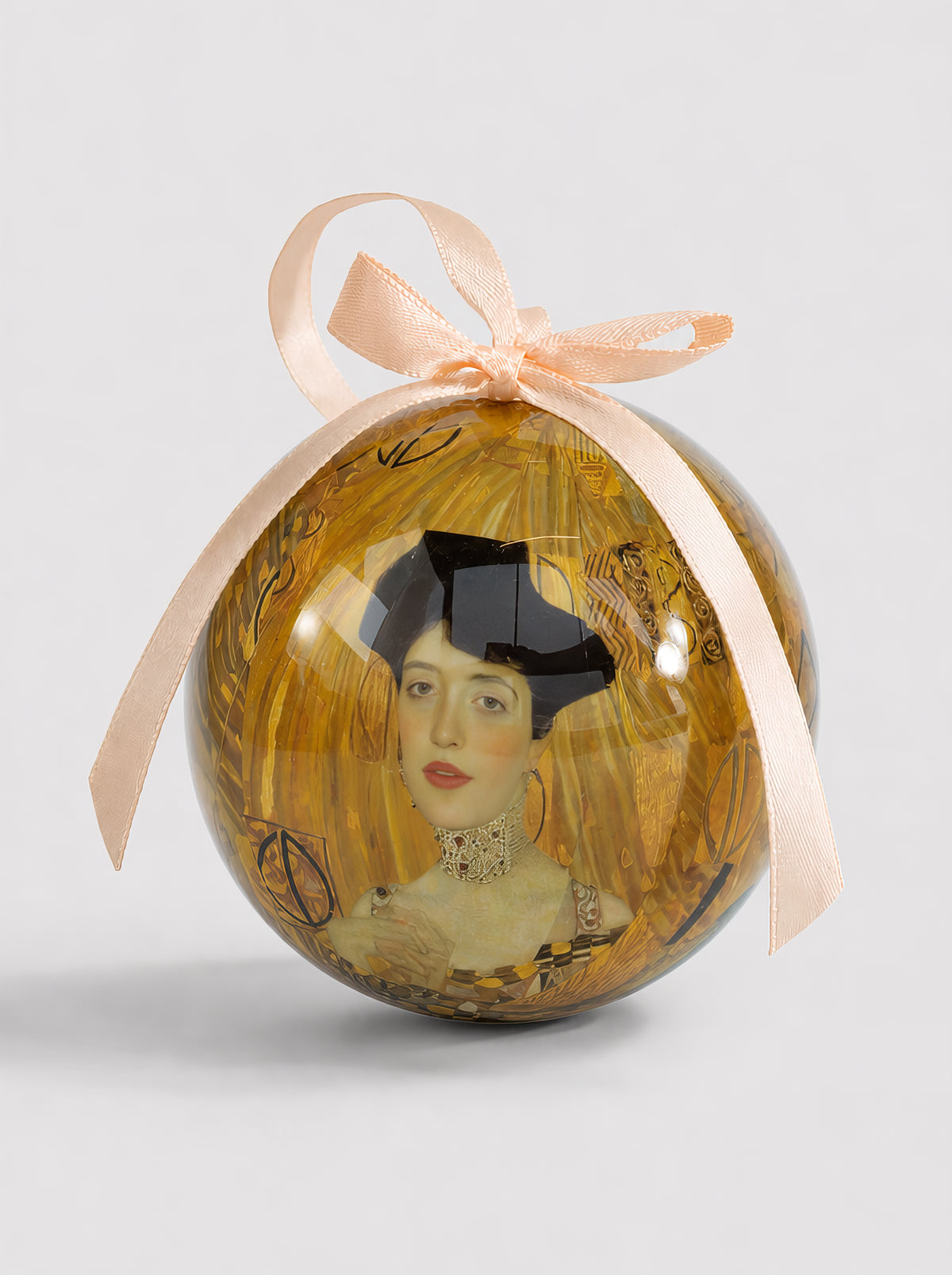 Gustav Klimt Adèle Bloch-Bauer I Christmas bauble with pink ribbon on a light grey background – officially licensed museum art ornament, 7 cm diameter, unbreakable, in gift box. A unique art Christmas gift from ArtyGifts.