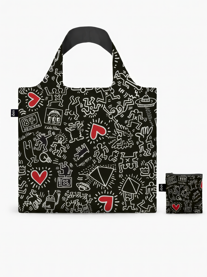LOQI Keith Haring Black Pattern shopper bag displayed upright beside its matching zip pouch on a white background.
