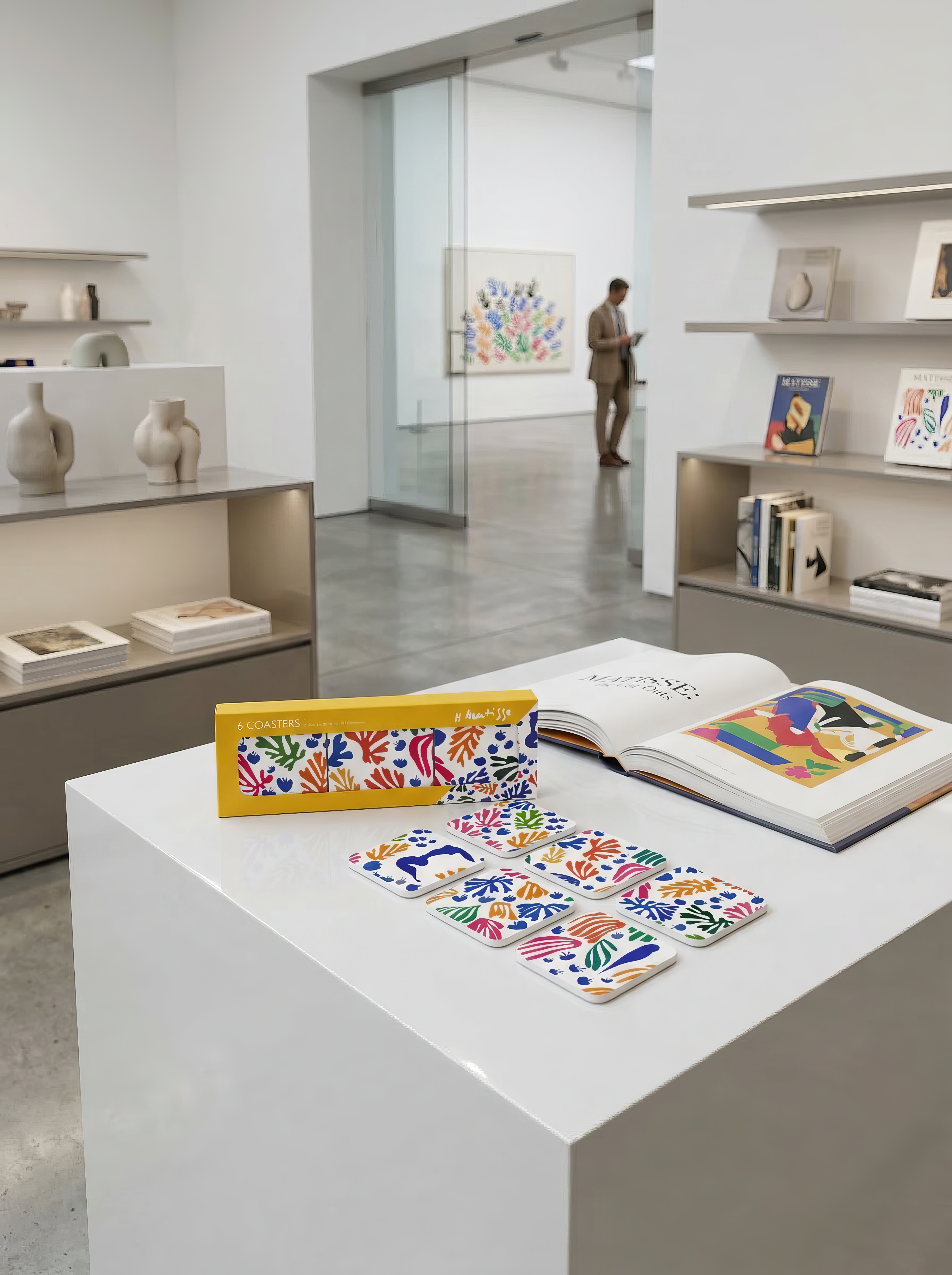 Matisse Parakeet and Mermaid coaster set with art book in museum gallery — art souvenir gift for him or her | ArtyGifts