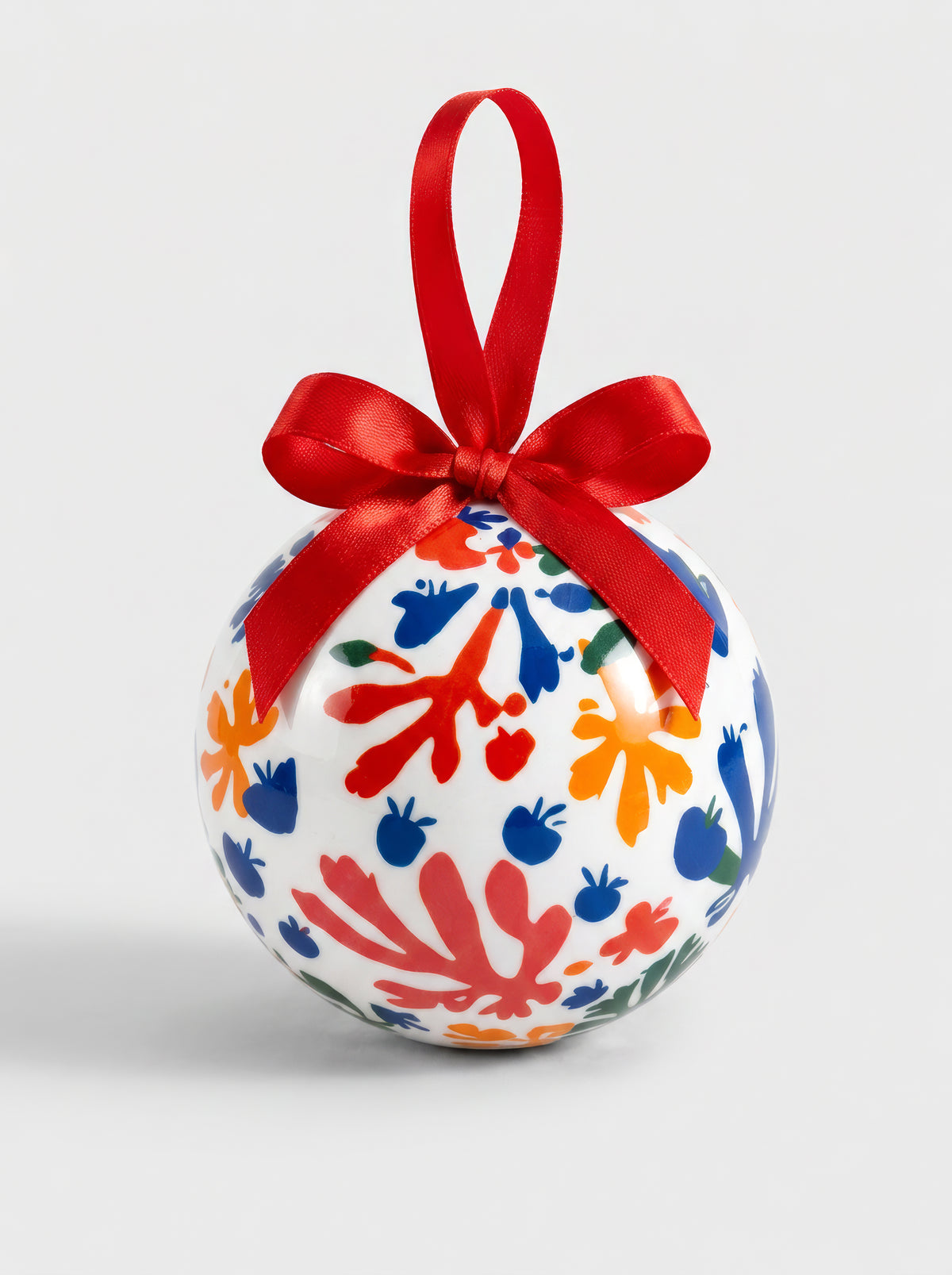 Matisse Parakeet and Mermaid Christmas bauble close-up on white background with red ribbon – officially licensed museum art ornament from ArtyGifts

