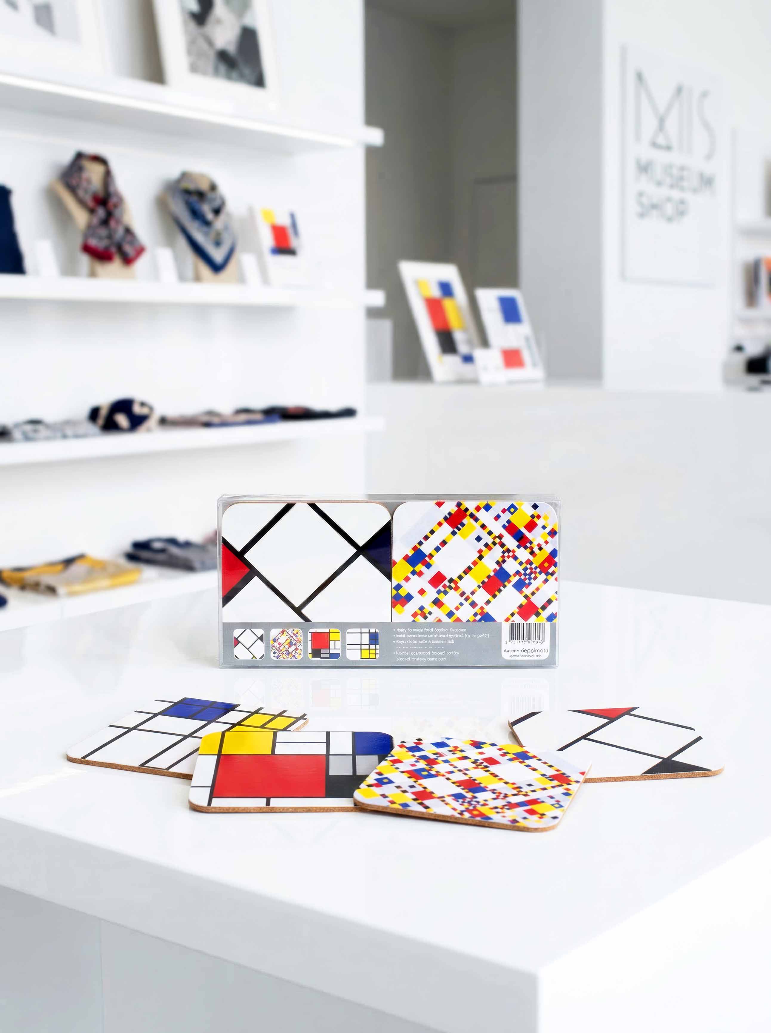 Mondrian Composition set of 4 cork coasters on museum table with gift box — museum art gift | ArtyGifts