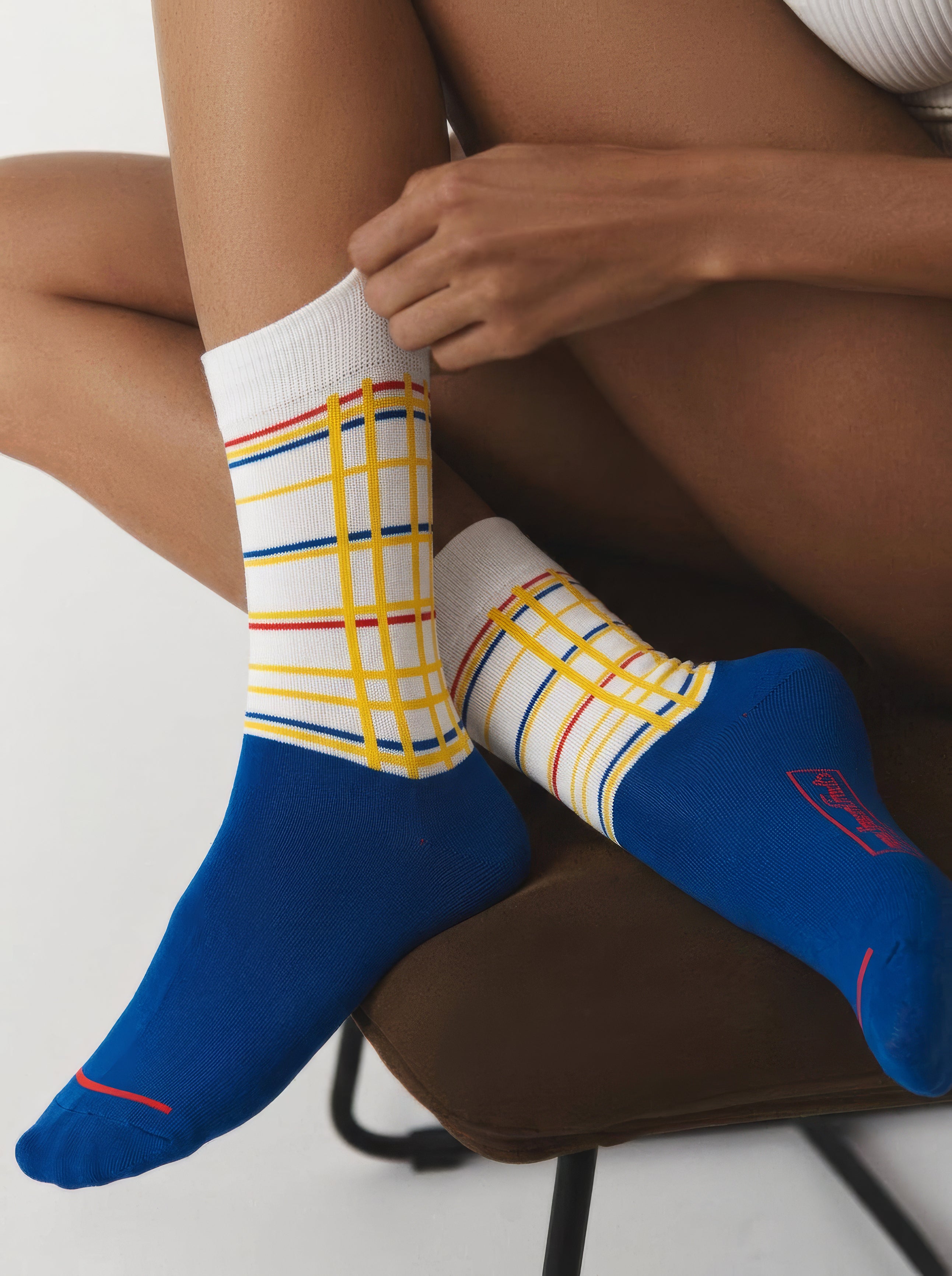 Mondrian New York City art sock flat lay close-up – unisex museum gift from ArtyGifts
