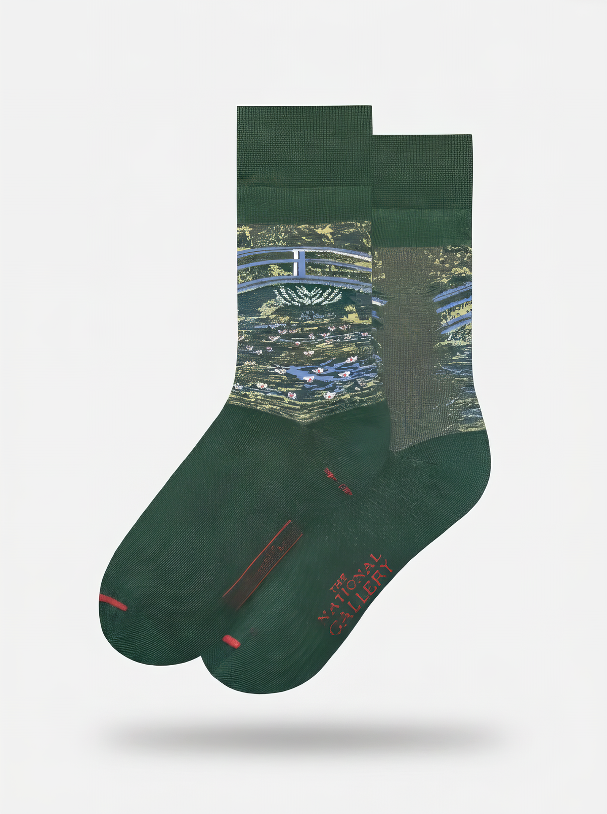 Pair of officially licensed green Claude Monet The Japanese Bridge art socks for women and men, shown on a white background. A thoughtful birthday or Christmas gift for art lovers.