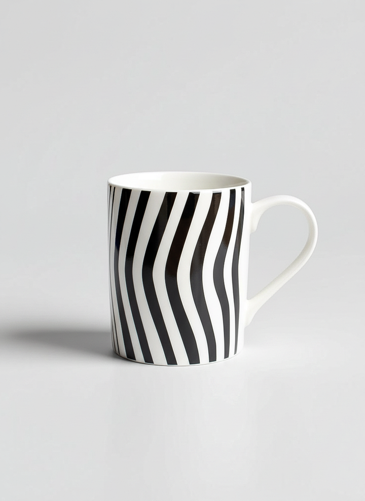 Optical Art porcelain mug close-up – black and white striped art design, ArtyGifts