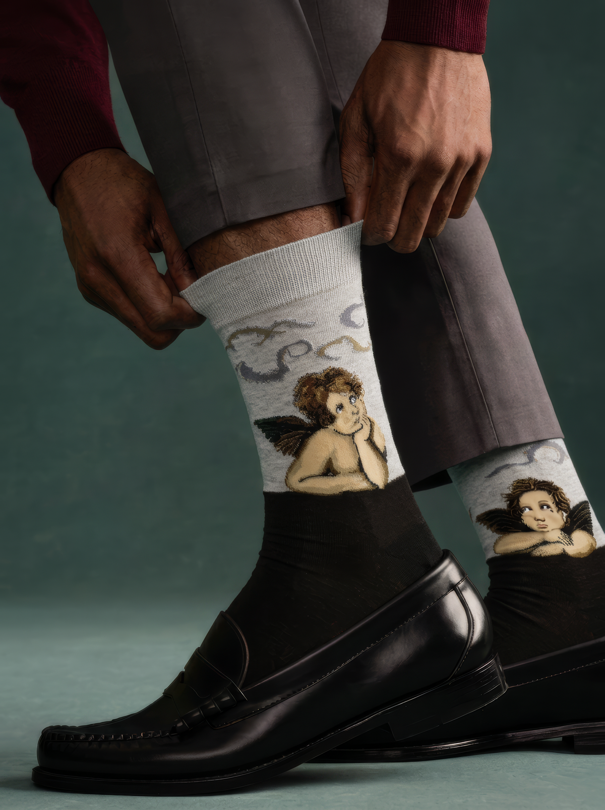 Sistine Madonna Angels art socks featuring Raphael’s artwork worn with black leather ankle boots