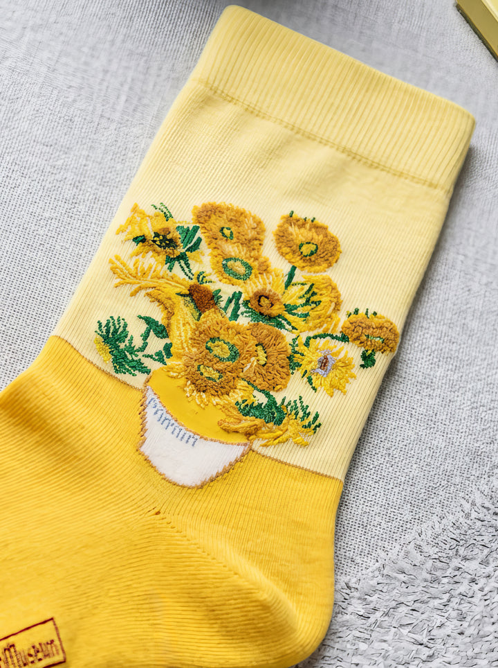 Sunflowers art sock flat lay close-up – unisex museum gift from ArtyGifts
