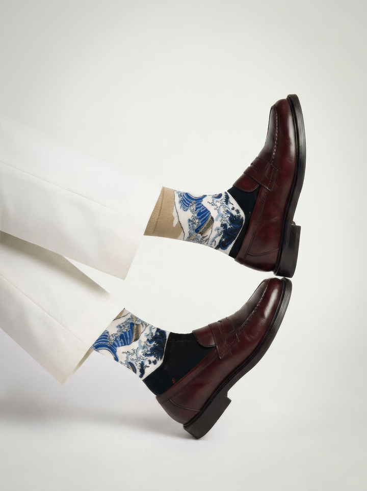 The Great Wave (Classic) art socks by Katsushika Hokusai styled with black high-heeled shoes on a white background