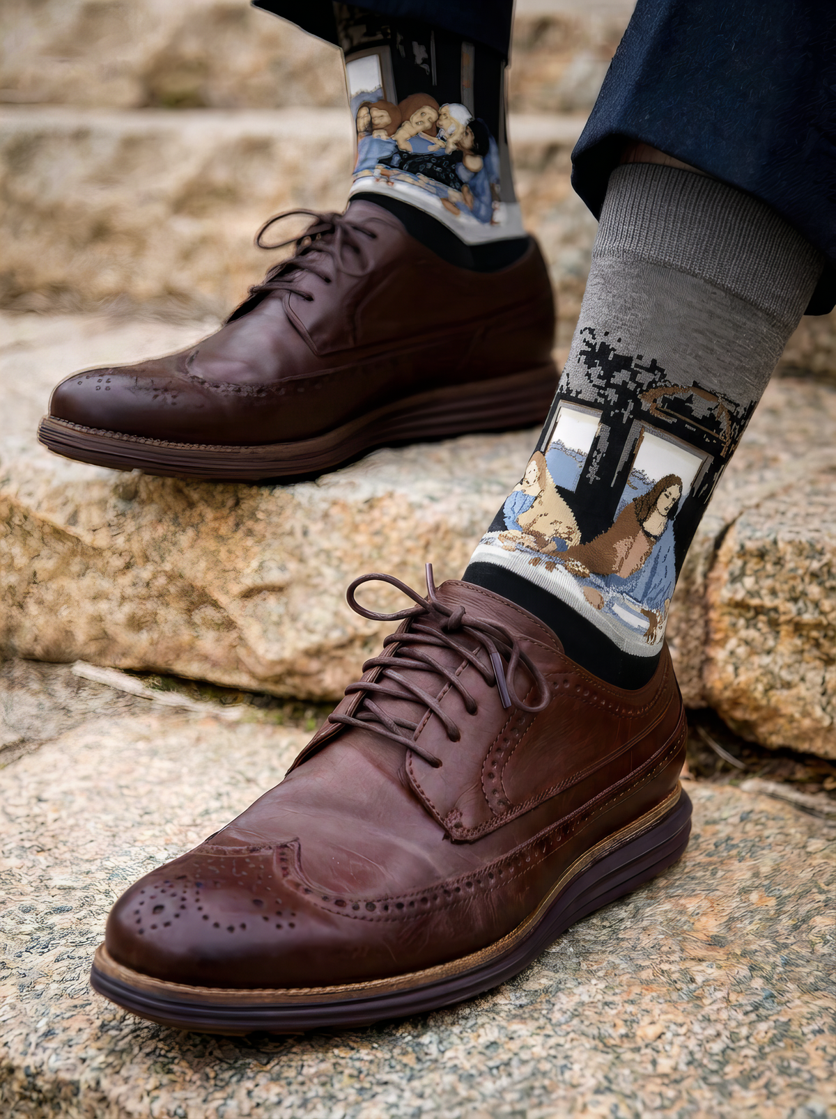 The Last Supper art socks featuring Leonardo da Vinci’s artwork worn with brown leather lace-up shoes on stone steps⠋

