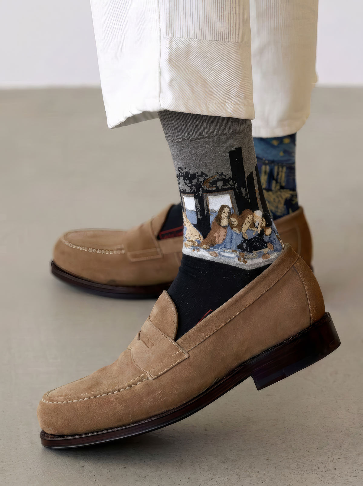 The Last Supper art socks featuring Leonardo da Vinci’s artwork worn with tan leather shoes and white trousers