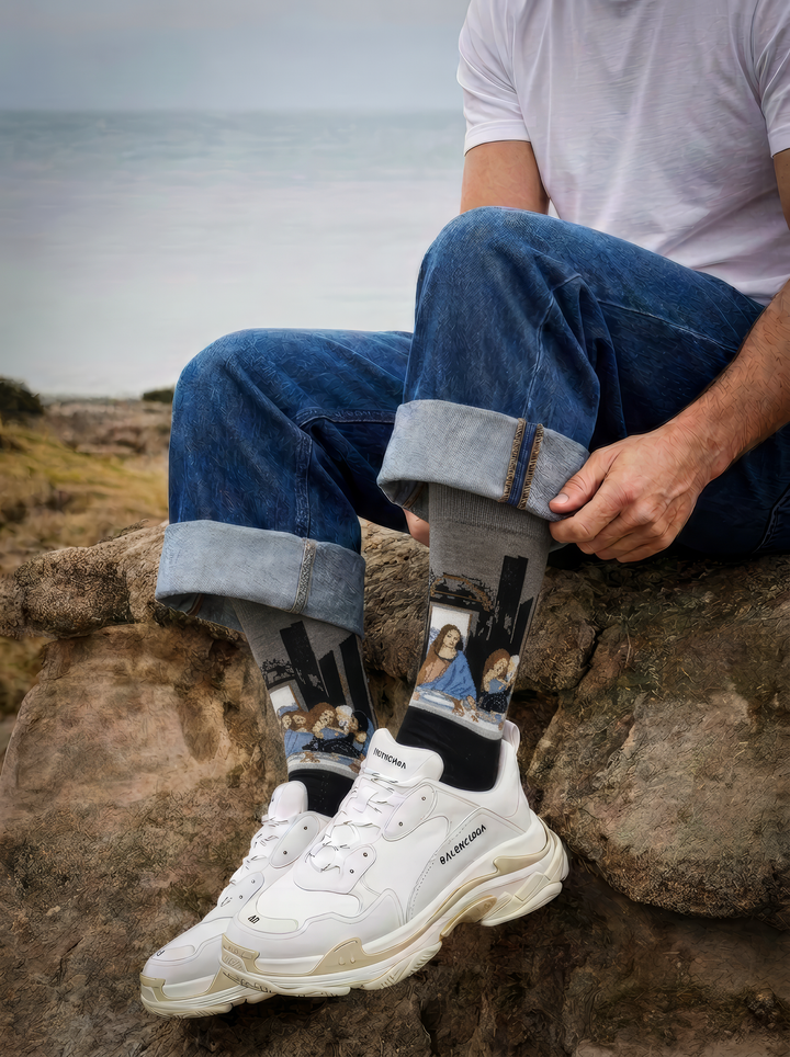 The Last Supper art socks featuring Leonardo da Vinci’s artwork worn with white sneakers and blue trousers