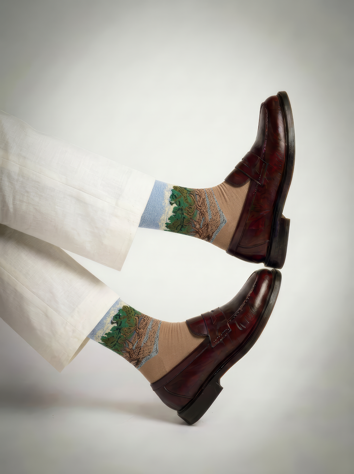 he Olive Trees art socks by Vincent van Gogh styled with black high-heeled pumps on a white background