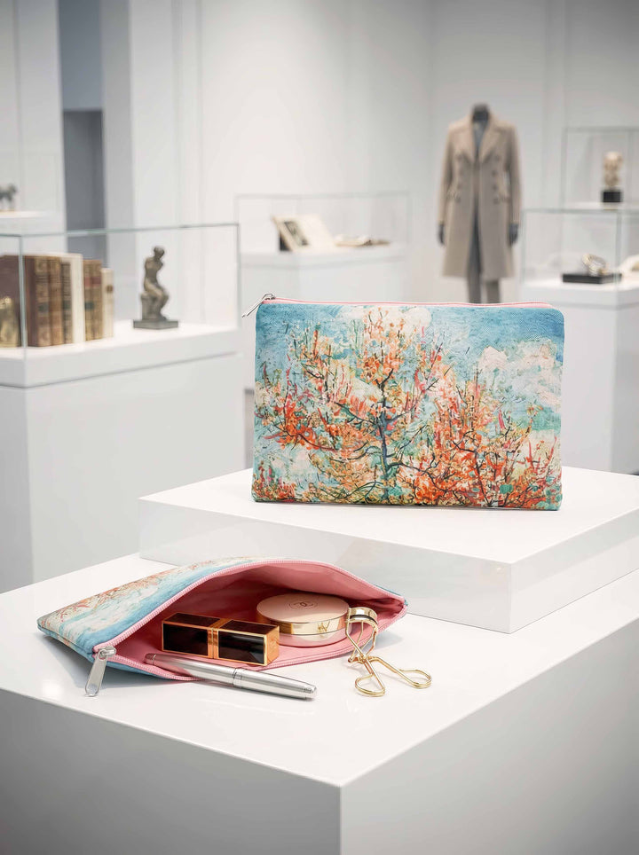 Van Gogh Souvenir de Mauve cosmetic travel bag open with make-up in museum setting — Van Gogh Museum art gift for her | ArtyGifts
