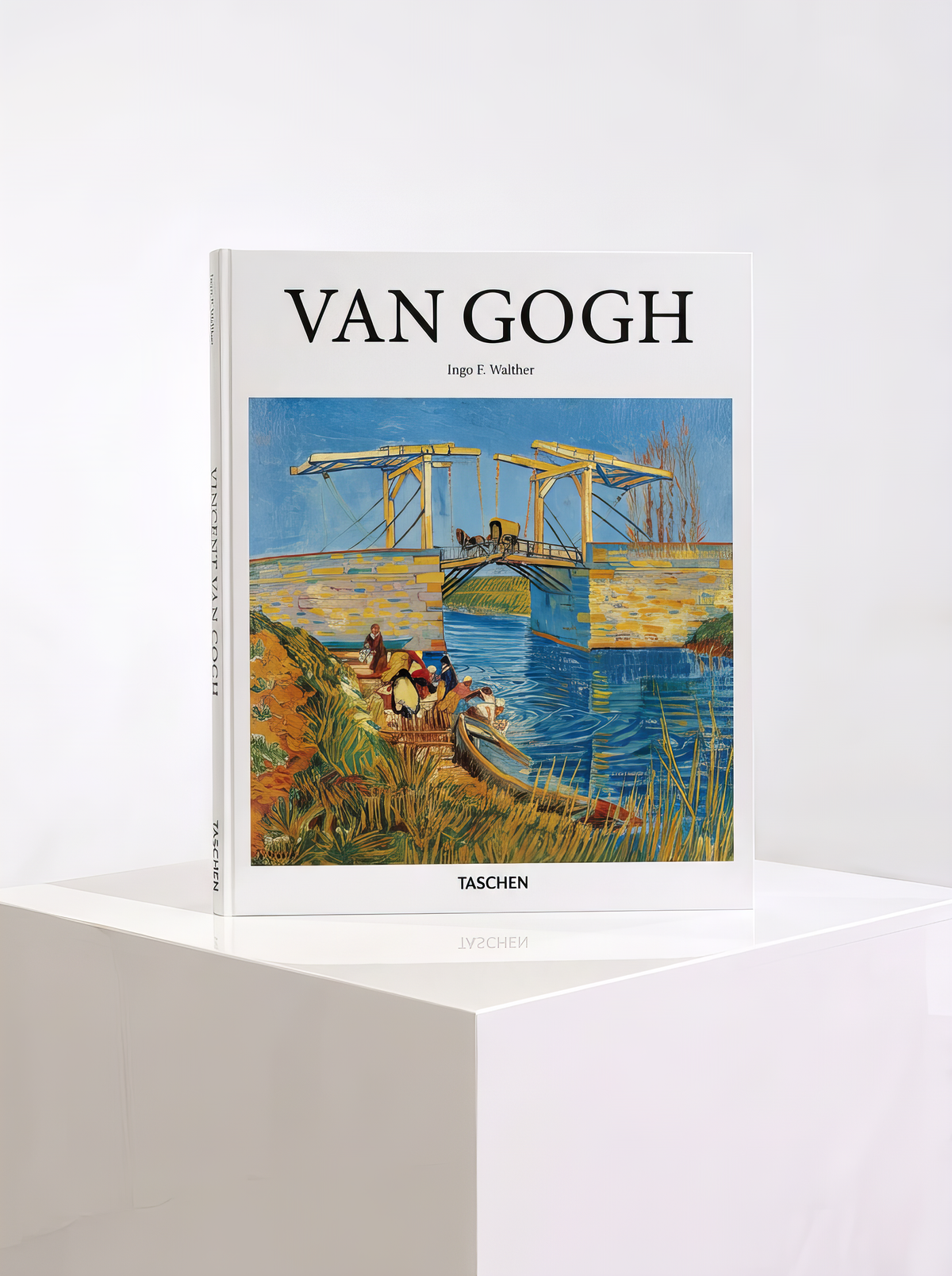 TASCHEN hardcover art book Van Gogh by Ingo F. Walther, featuring a bridge-and-canal painting on the cover, displayed on a white pedestal.⠋

