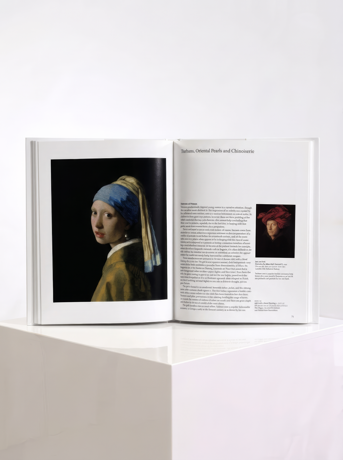 Open TASCHEN Vermeer art book displayed on a white plinth, showing a full-page artwork on the left and text with a smaller illustration on the right.
