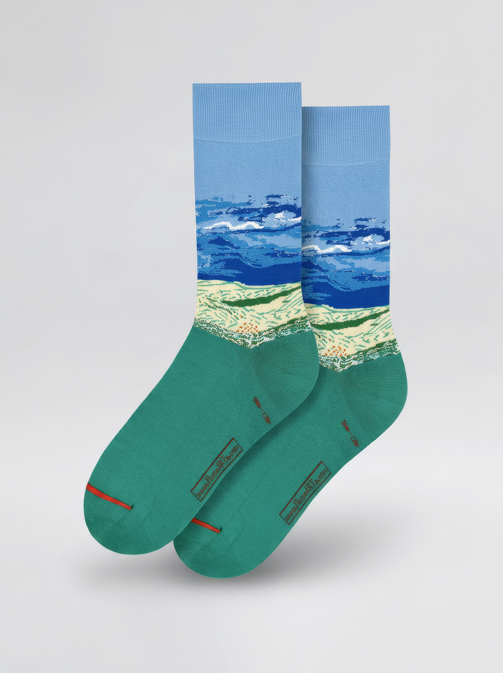 Pair of Wheat Field under Thunderstorm Sky art socks by Vincent van Gogh shown on a white background