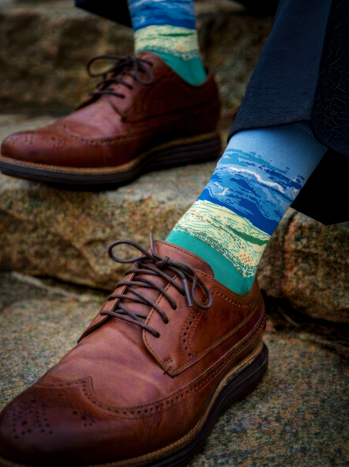 Wheat Field under Thunderstorm Sky unisex art socks by Vincent van Gogh worn with brown leather brogue shoes on stone steps⠋

