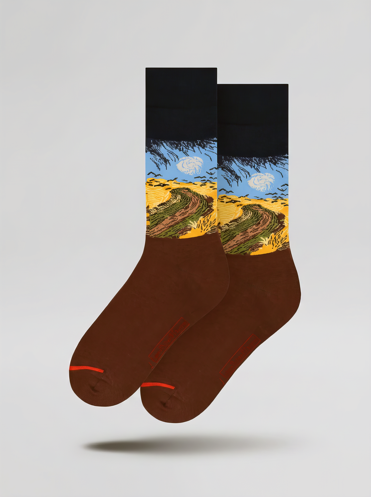 Pair of Wheatfield with Crows art socks by Vincent van Gogh shown on a white background