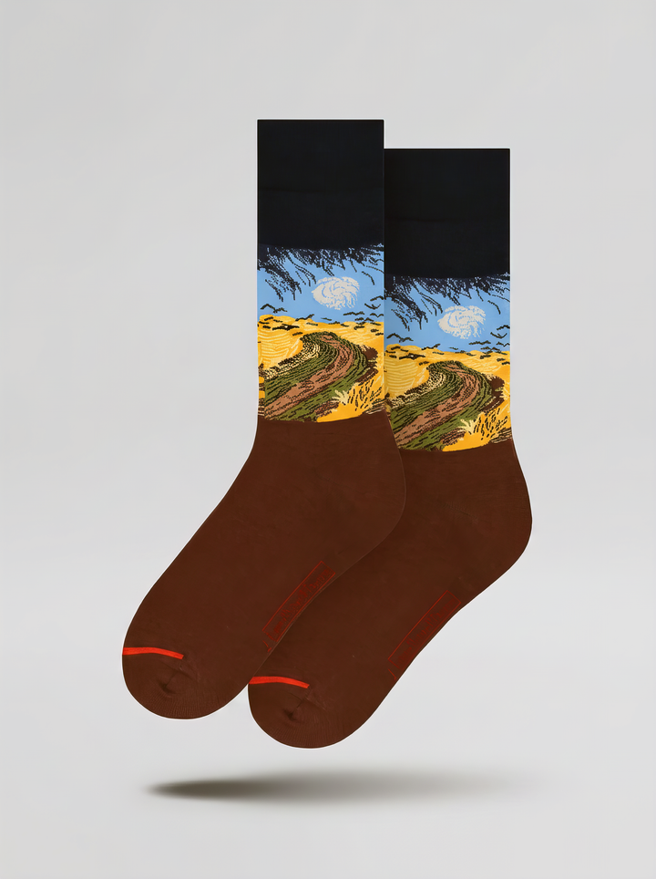 Pair of Wheatfield with Crows art socks by Vincent van Gogh shown on a white background