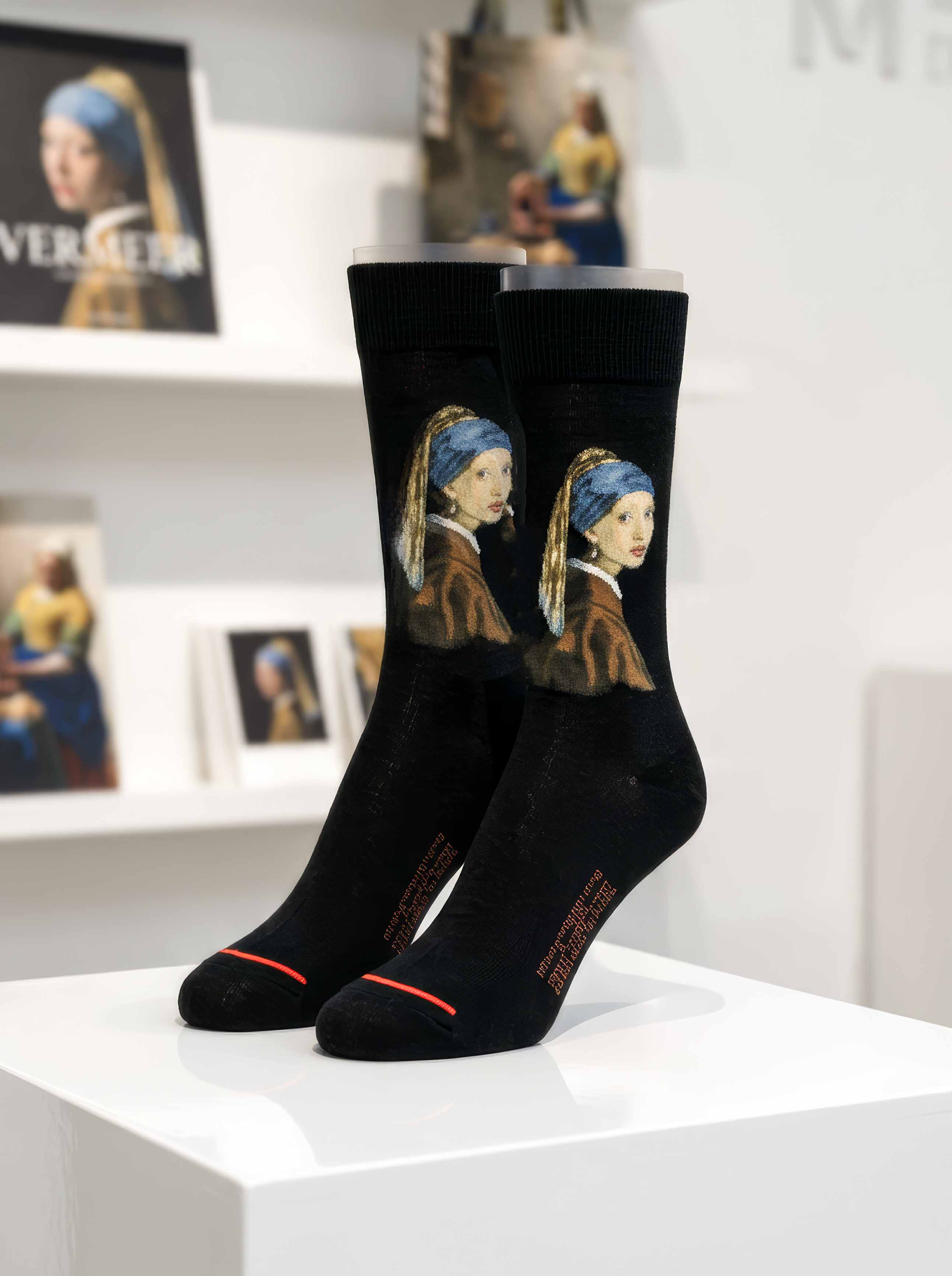 MuseARTa Vermeer Girl with the Pearl Earring art socks in museum setting with Vermeer paintings — unisex art gift ArtyGifts