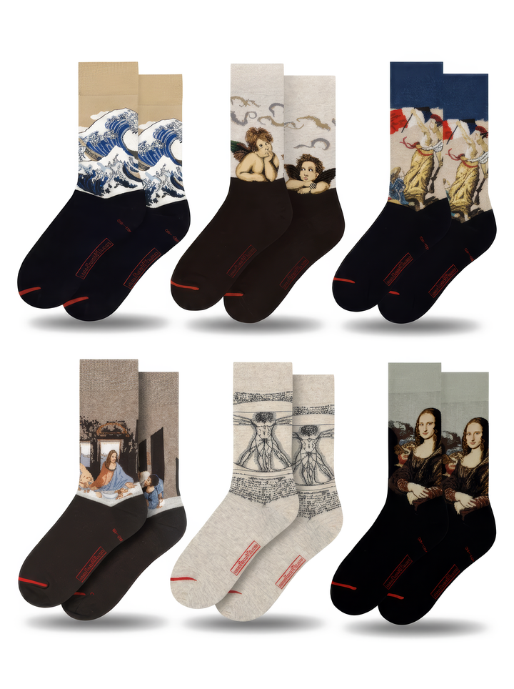 Six different pairs of XL museum art socks featuring Hokusai, Raphael, Delacroix and Leonardo da Vinci, arranged on a white background
