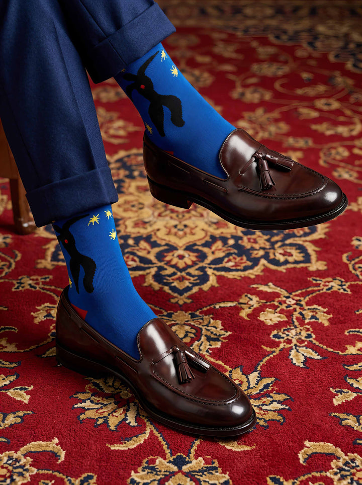 Man wearing Matisse Icarus art socks with brown Oxford shoes on red carpet — elegant art gift ArtyGifts