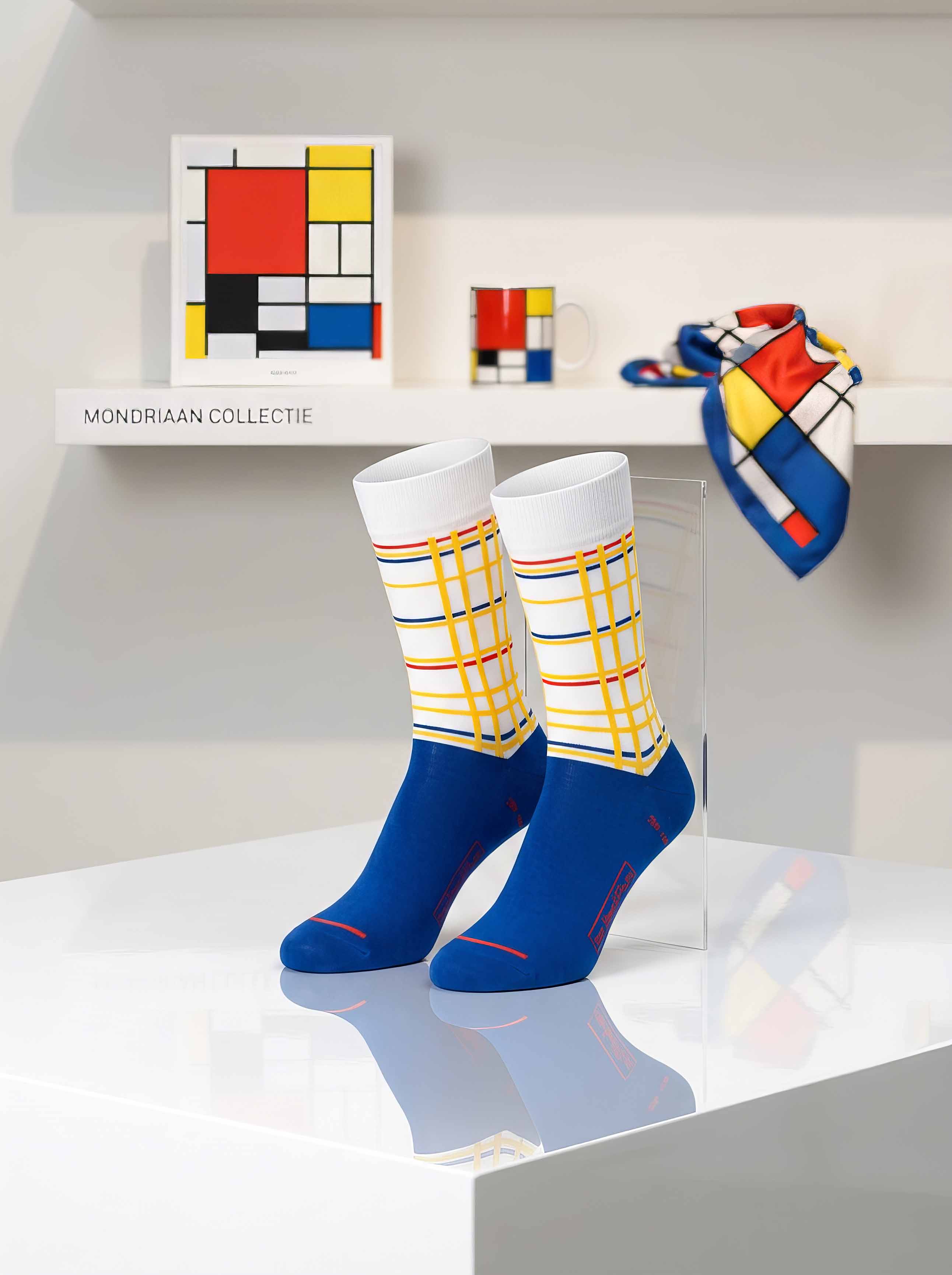 MuseARTa Mondrian New York City art socks with gift box in museum setting — unisex De Stijl museum gift ArtyGifts