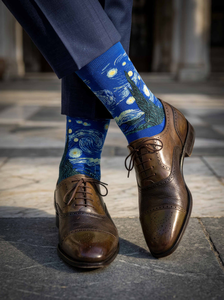 Person wearing MuseARTa Van Gogh Starry Night art socks with brown Oxford shoes outdoors — Post-Impressionism museum gift ArtyGifts
