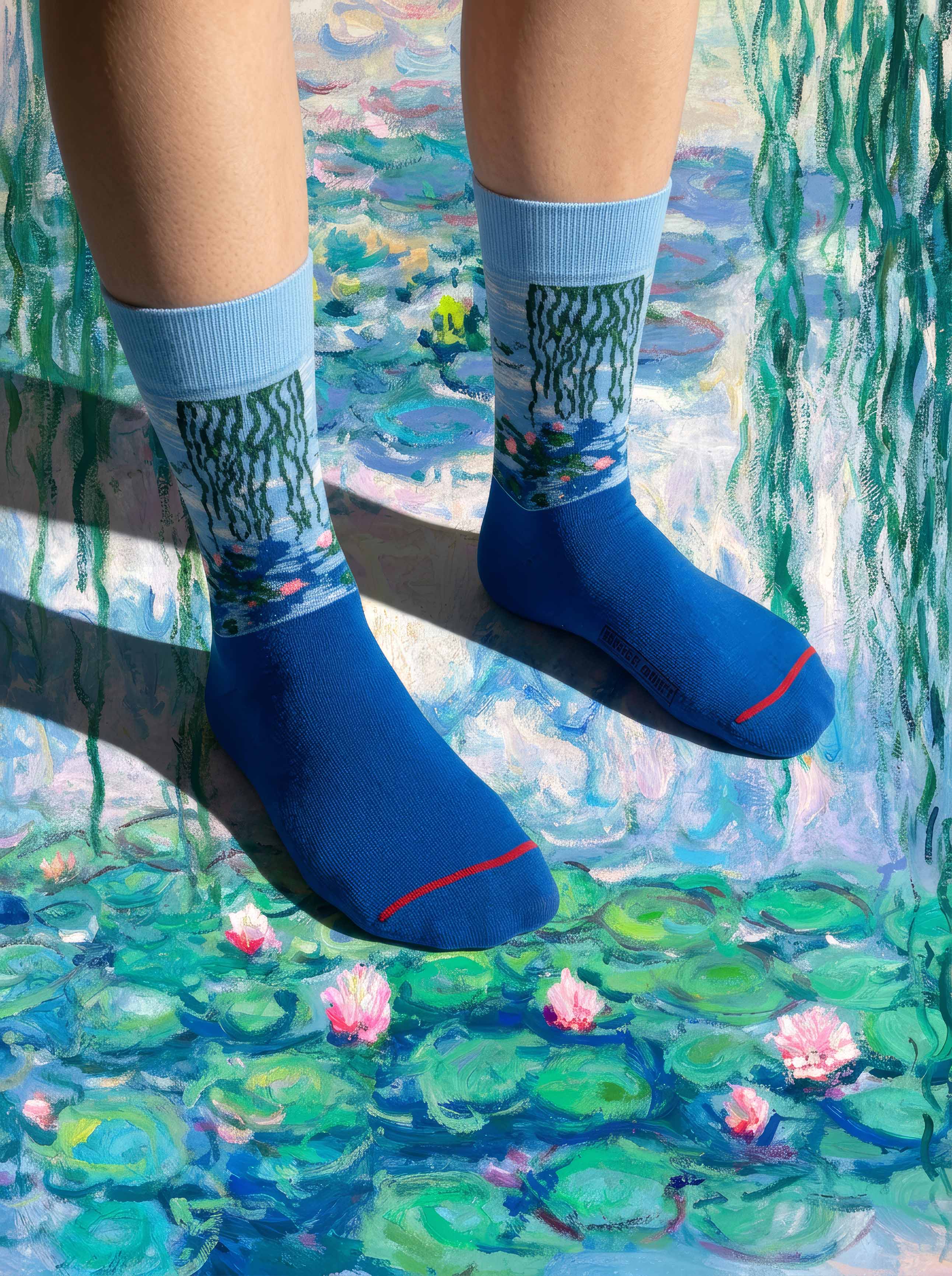 MuseARTa Monet Water Lilies art socks worn standing on Water Lilies pond — unisex museum art gift ArtyGifts